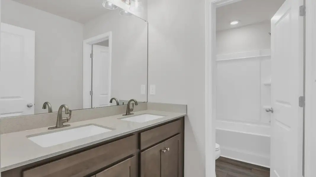 Furnished interior view inside a new home in Chestnut Farms, Longs (Image 17).
