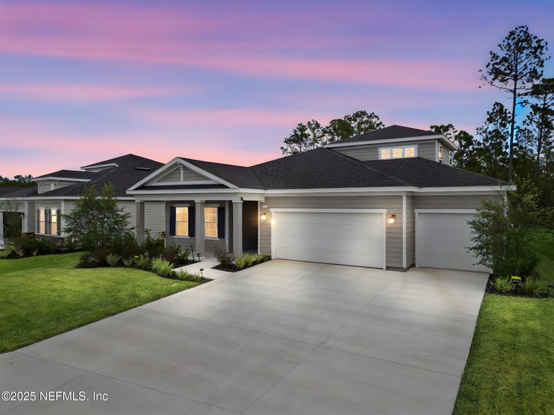 Front exterior of a new home in Seminole Palms Single-Family Homes, Palm Coast, FL, highlighting curb appeal (Image 20).