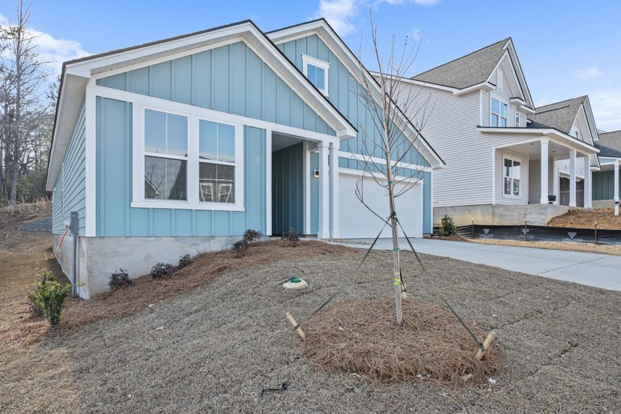 Exterior details and patio area of a home in Grand Arbor, Blythewood (Image 23).