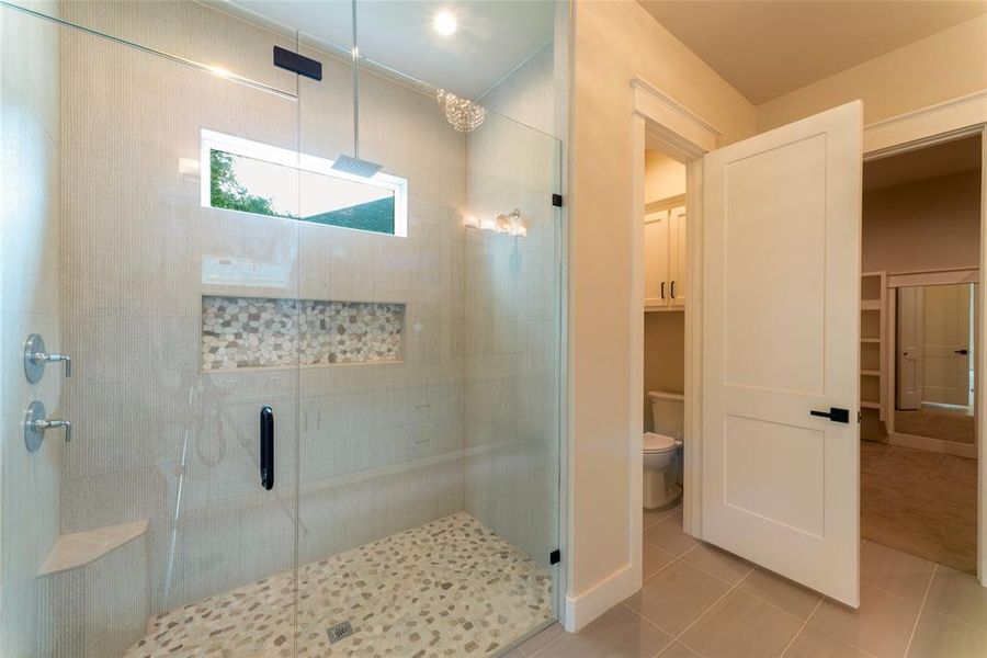 Primary bath with huge walk-in shower.