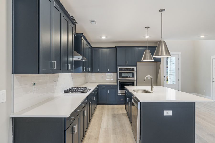 Representative furnished interior of a home built from the Riggs by Hunter Quinn Homes in Landing at Clemson Marina, Seneca (Image 6).
