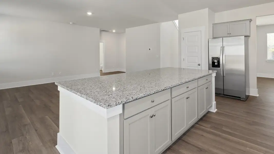 Furnished interior view inside a new home in The Highlands at Cedar Hill Landing, Navassa (Image 9).