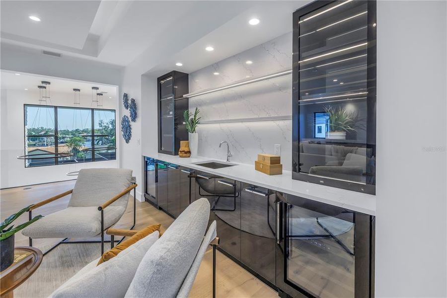 Flex Space with wet bar and recessed LED lighting Flex Space with wet bar and recessed LED lighting