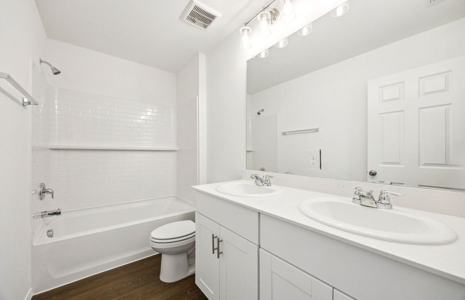 Representative furnished interior of a home built from the Monroe by Centex in Ashford Crossing, Princeton (Image 5).