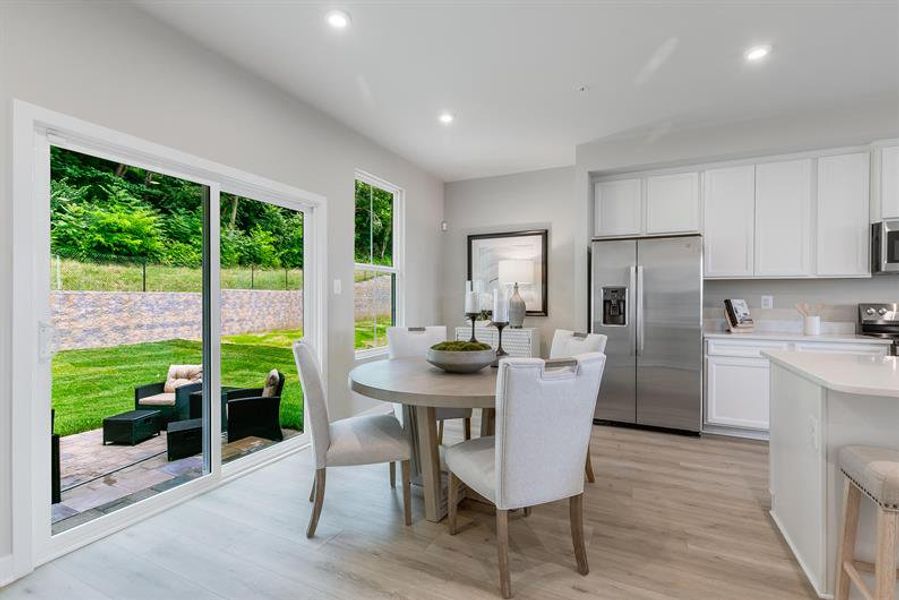 Representative furnished interior of a home built from the Overture by Ryan Homes in Moore Farm Townhomes, Indian Trail (Image 23).
