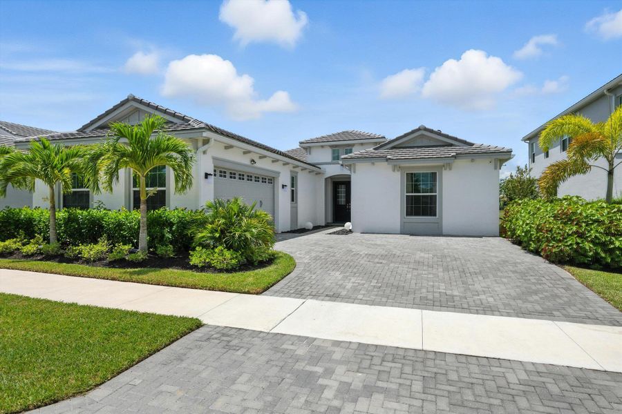Front exterior of a new home in , Westlake, FL, highlighting curb appeal (Image 21).