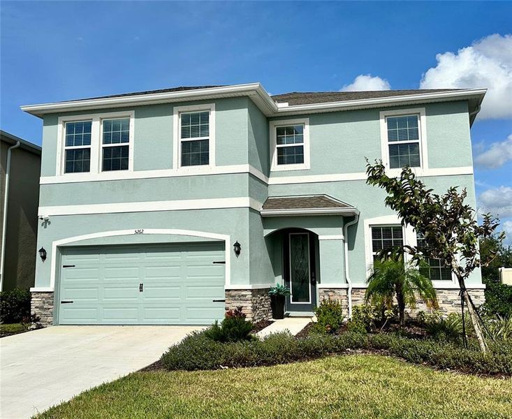 Front exterior of a new home in Solera at Lakewood Ranch, Lakewood Ranch, FL, highlighting curb appeal (Image 29).