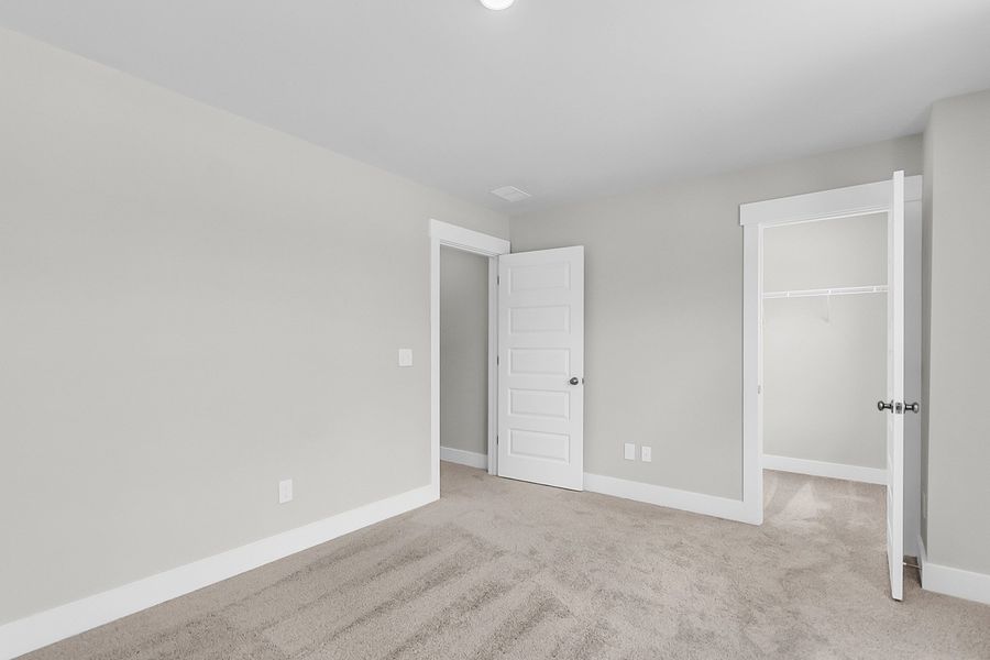 Spacious, unfurnished interior of a new home in Pineland Preserve, Summerville (Image 51).