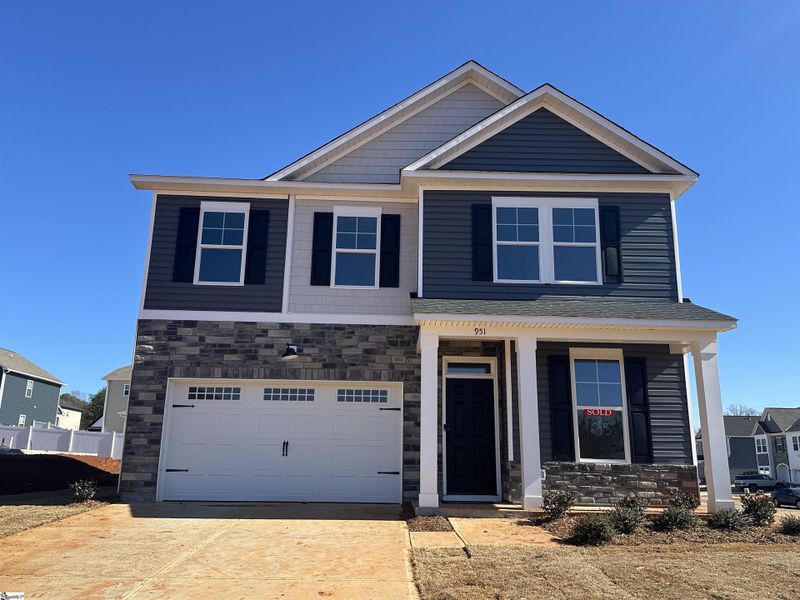 Front exterior of a new home in Shiloh Trail, Wellford, SC, highlighting curb appeal (Image 2). Front exterior of a new home in Shiloh Trail, Wellford, SC, highlighting curb appeal (Image 2).