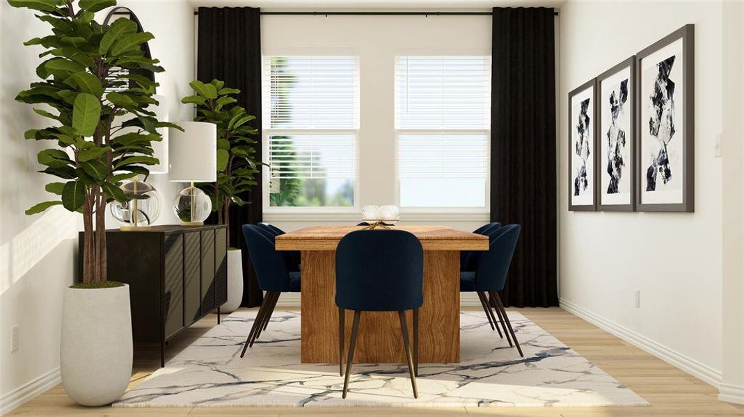 Dining room with light hardwood / wood-style flooring