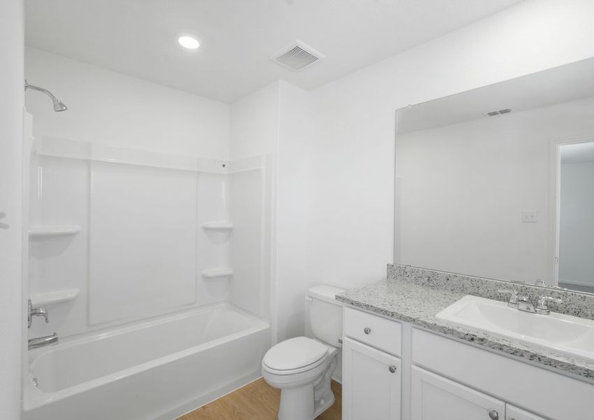 Bathroom with a shower/tub combination