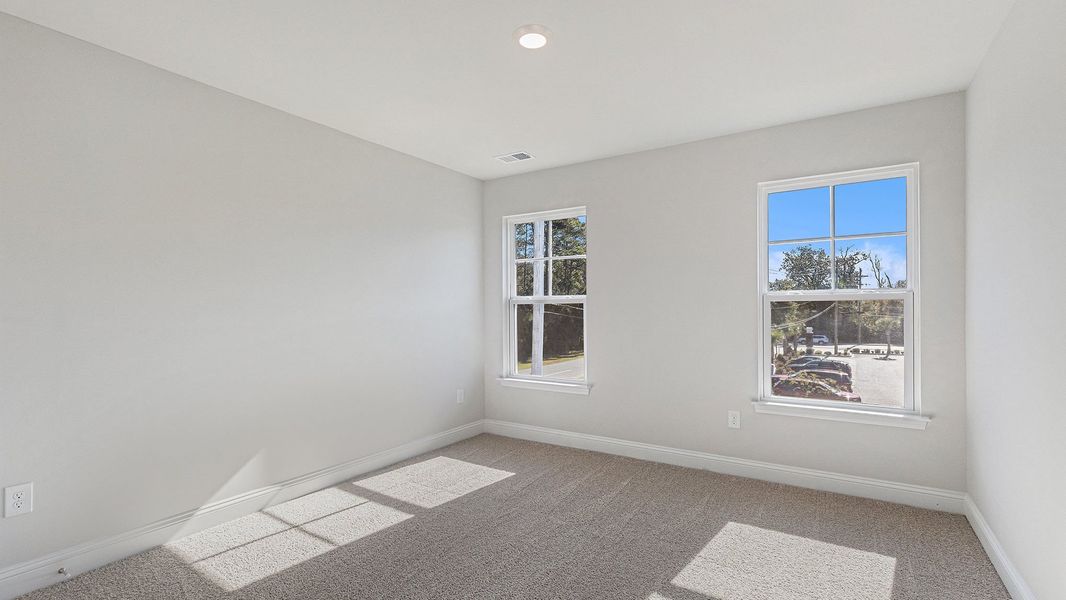 Spacious, unfurnished interior of a new home in Belle Park, North Myrtle Beach (Image 18).