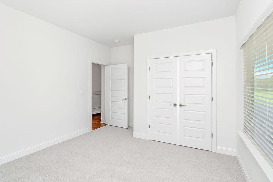 Spacious, unfurnished interior of a new home in Waters Edge, Mansfield (Image 9).