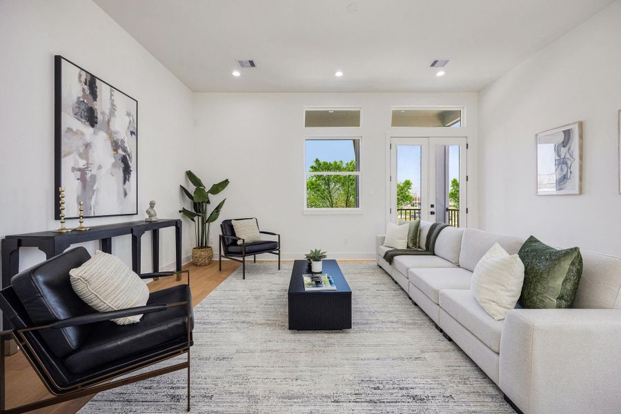 Spacious living room and balcony located on the second floor