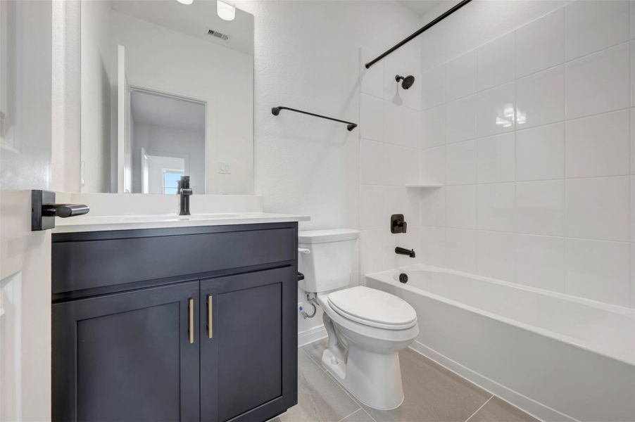 Furnished interior view inside a new home in The Grand Prairie 50’, Hockley (Image 11).