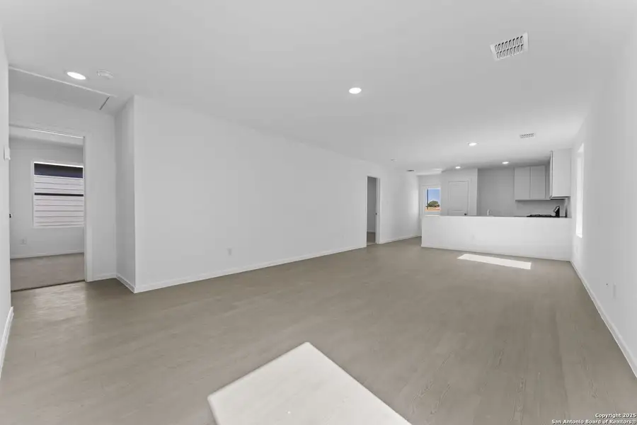 Spacious, unfurnished interior of a new home in Randolph Crossing: Cottage Collection, Converse (Image 10).