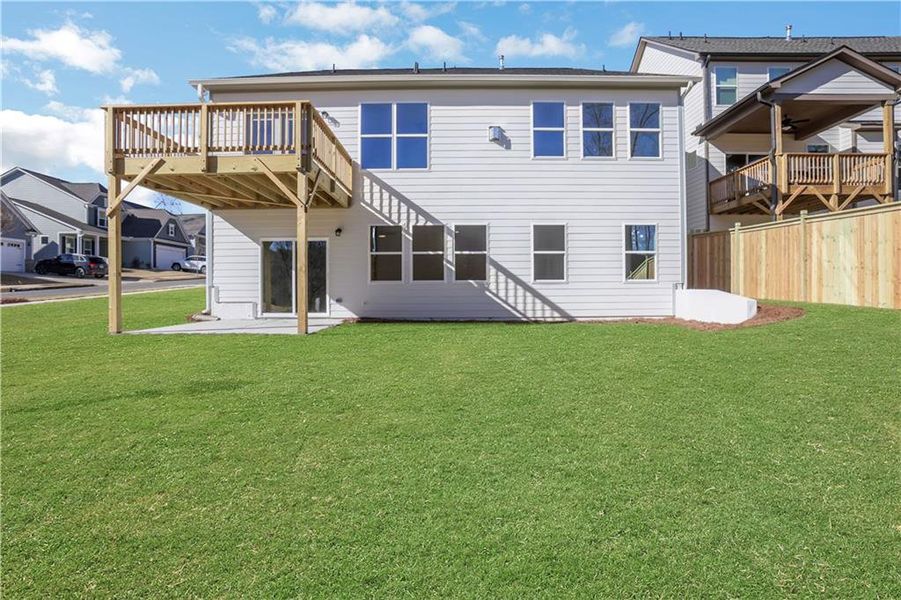Exterior details and patio area of a home in Marble Tree, Ball Ground (Image 24).