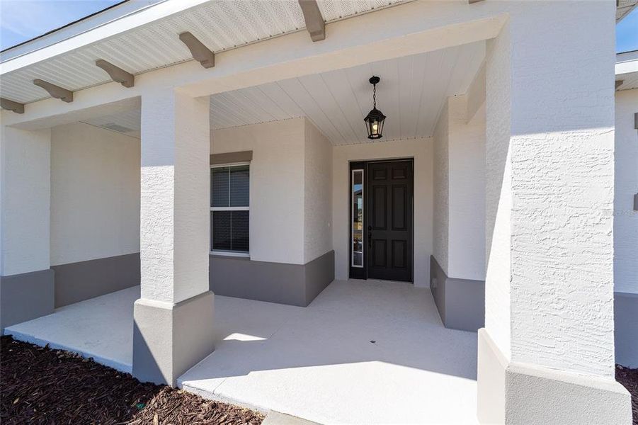 Exterior details and patio area of a home in On Top of the World Communities, Ocala (Image 24).