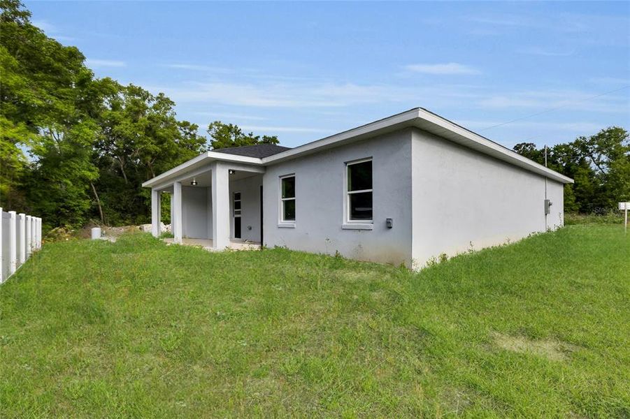 Exterior details and patio area of a home in , Ocala (Image 4).