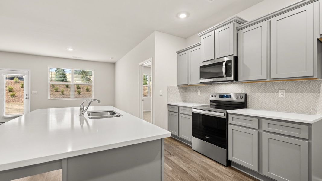 Representative furnished interior of a home built from the Aria by D.R. Horton in Champion's Run, Lithonia (Image 5).