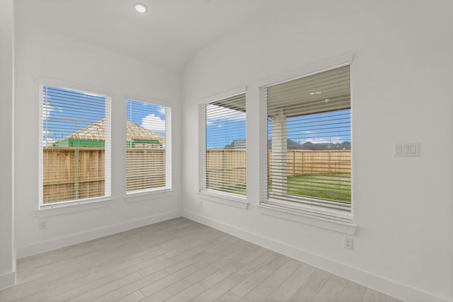 Representative unfurnished interior of a home built from the Pinehurst by Chesmar Homes in Riceland Alley Loads, Mont Belvieu (Image 21).