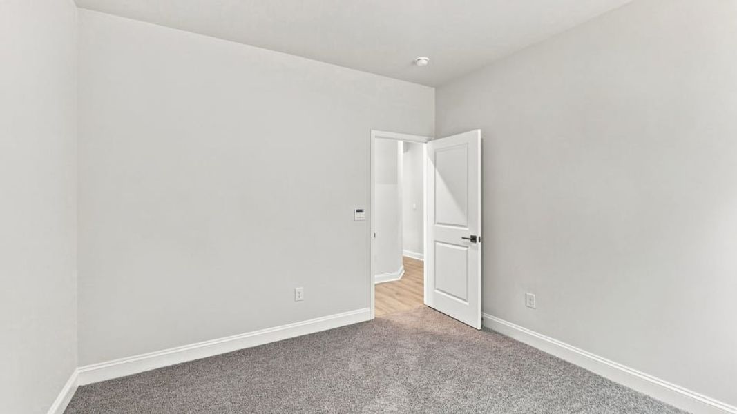 Spacious, unfurnished interior of a new home in Rutledge Estates, Woodruff (Image 28).