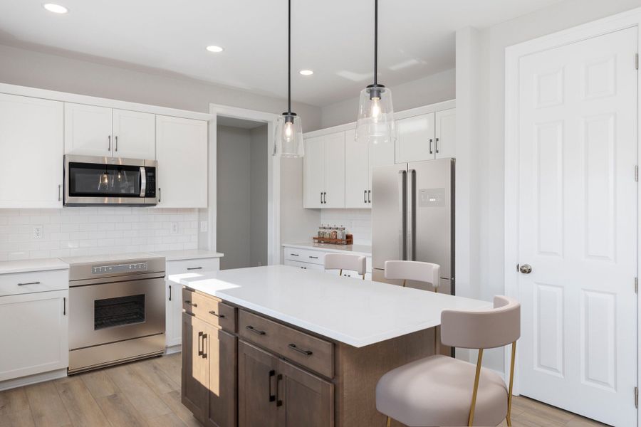 Representative furnished interior of a home built from the The Hawthorne by Forbes Capretto Homes in Cannon Woods, Clarence (Image 7).