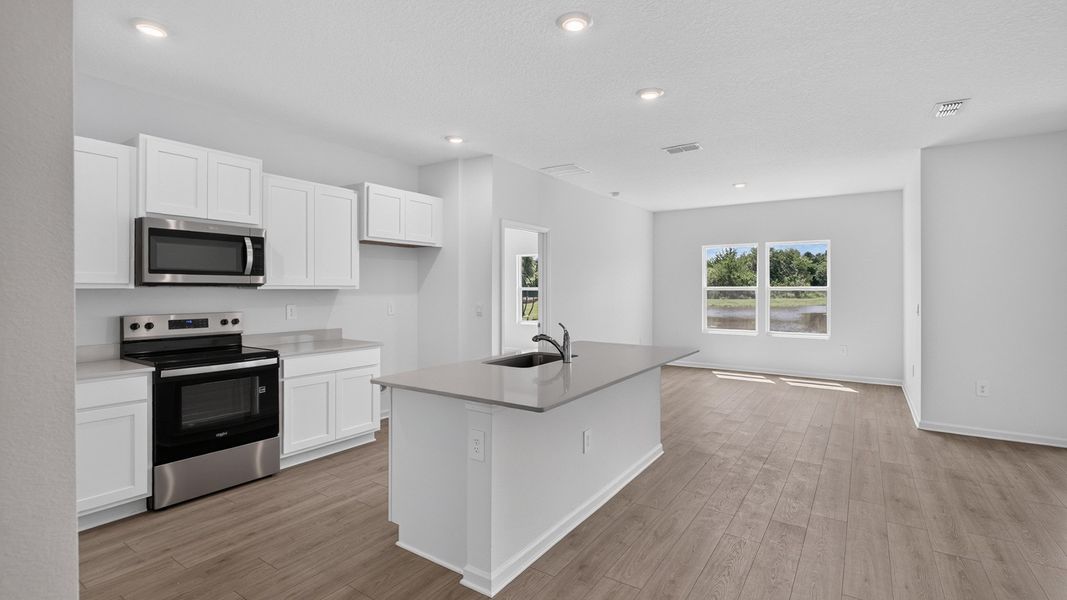 Representative furnished interior of a home built from the Aria+ by D.R. Horton in Diamond Springs, Jacksonville (Image 6).