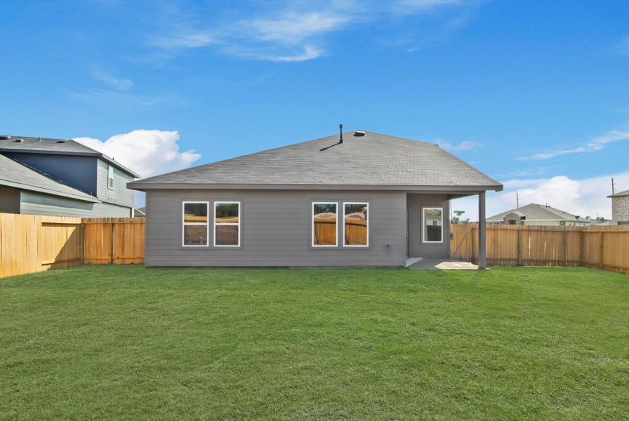 Exterior details and patio area of a home in Grand Pines, Magnolia (Image 3). Exterior details and patio area of a home in Grand Pines, Magnolia (Image 3).
