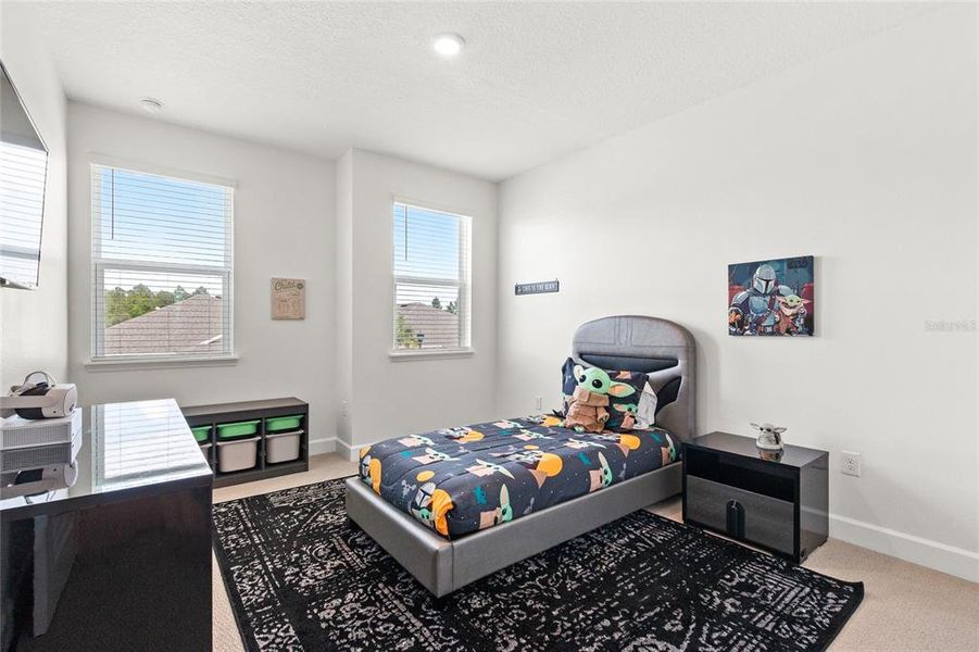 Furnished interior view inside a new home in Harvest at Ovation, Winter Garden (Image 17).