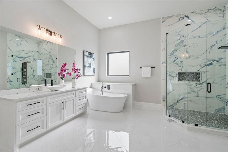 Bathroom with shower with separate bathtub and vanity