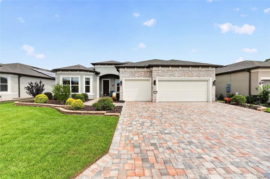 Front exterior of a new home in , Ocala, FL, highlighting curb appeal (Image 22).