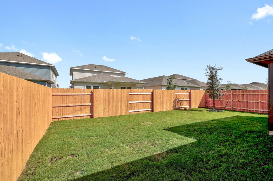 Exterior details and patio area of a home in Prairie Winds, Hutto (Image 4).