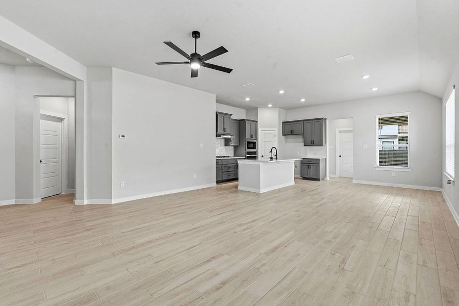 An open-concept design unites the generous living area with a contemporary kitchen, perfect for entertaining.