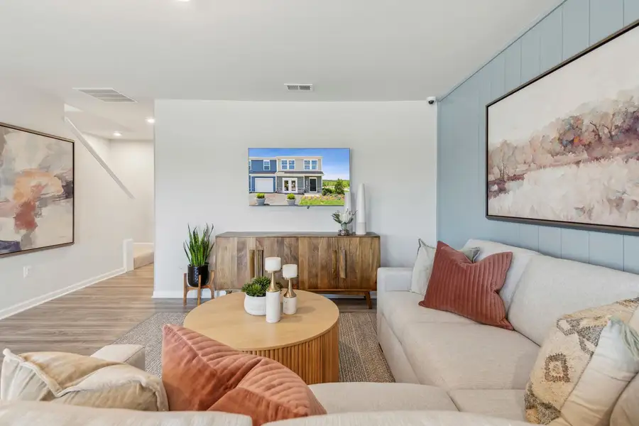 Representative furnished interior of a home built from the The Rutledge by Stanley Martin Homes in Essence at Trinity Townhomes, Columbia (Image 16).