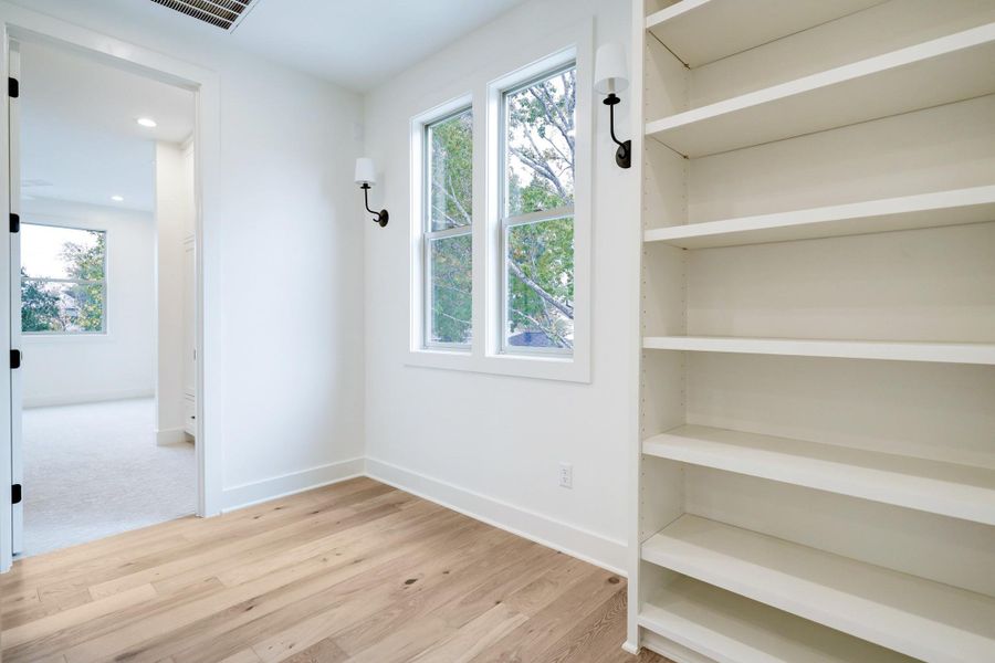 Atop the landing is built-in shelving and a small nook to create a reading space or additional study/homework area. *Previous Project*