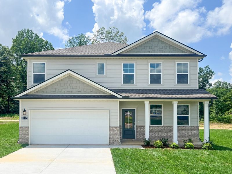 Front exterior of a new home in Highland Reserves, Pleasant View, TN, highlighting curb appeal (Image 1).