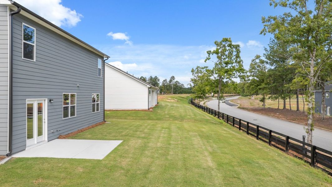 Representative exterior details of a home built from the Elle by D.R. Horton in Fairway 17 at Mirror Lake, Villa Rica (Image 30). Representative exterior details of a home built from the Elle by D.R. Horton in Fairway 17 at Mirror Lake, Villa Rica (Image 30).