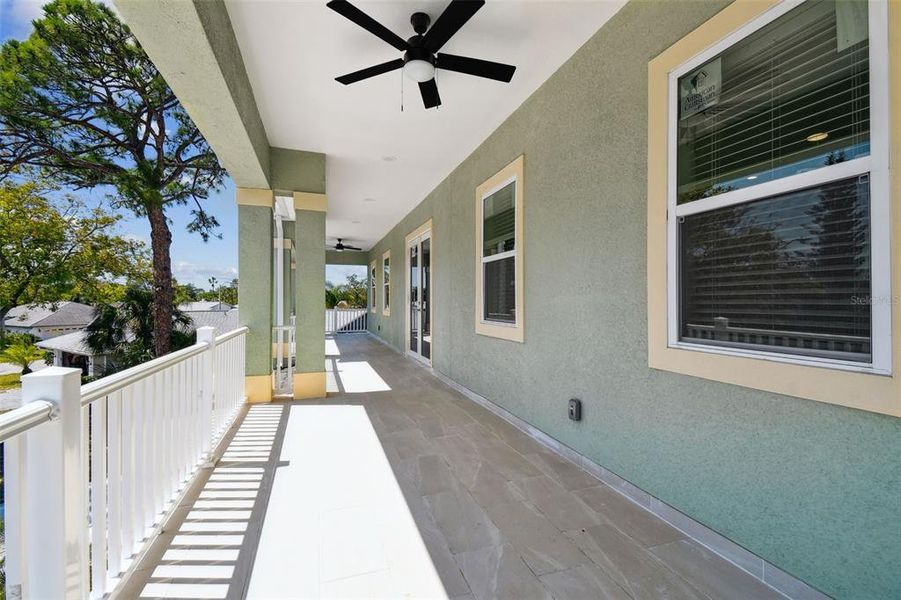FRONT PORCH BALCONY WITH FANS