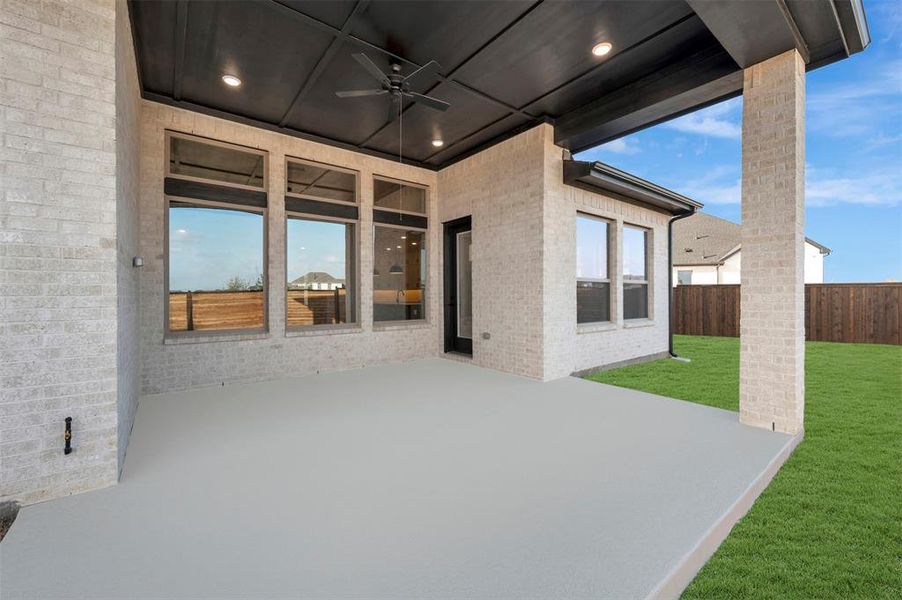Exterior details and patio area of a home in The Ridge at Northlake, Northlake (Image 25).