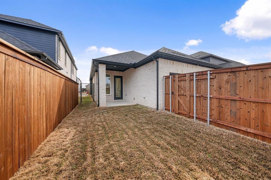 Exterior details and patio area of a home in Cottages of Celina, Celina (Image 4).
