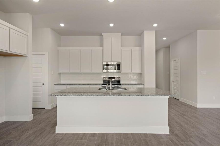 Furnished interior view inside a new home in Saddleback Estates, Boyd (Image 10). Furnished interior view inside a new home in Saddleback Estates, Boyd (Image 10).