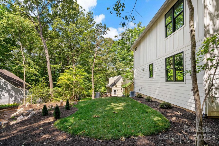 Exterior details and patio area of a home in , Asheville (Image 3).