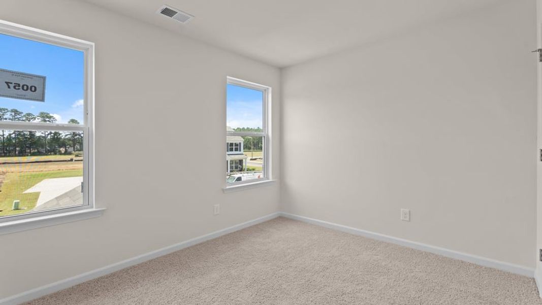 Spacious, unfurnished interior of a new home in Hobbs Farm, Ayden (Image 23).