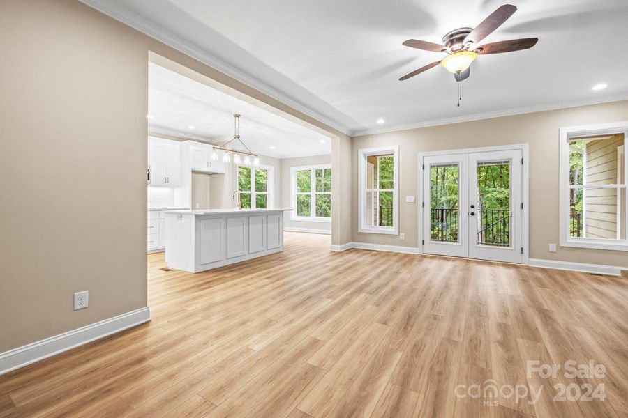 Glass doors open to the back porch