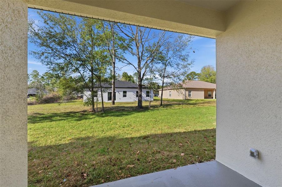 Exterior details and patio area of a home in , Citrus Springs (Image 20).