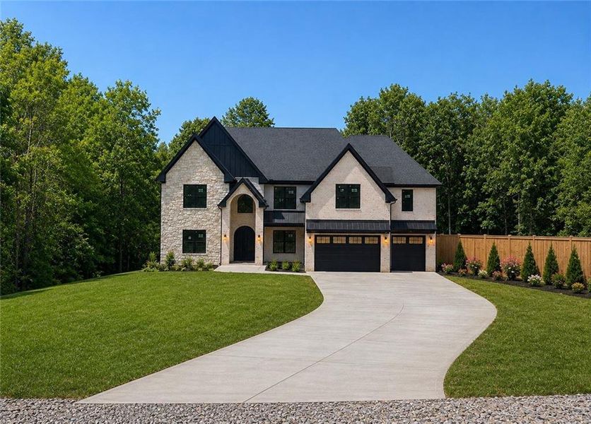 Front exterior of a new home in , Suwanee, GA, highlighting curb appeal (Image 1). Front exterior of a new home in , Suwanee, GA, highlighting curb appeal (Image 1).