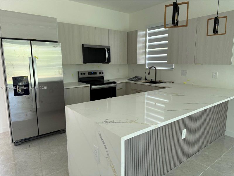 Furnished interior view inside a new home in , Punta Gorda (Image 29).