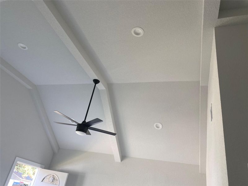 View of the living room fan and beams. View of the living room fan and beams.