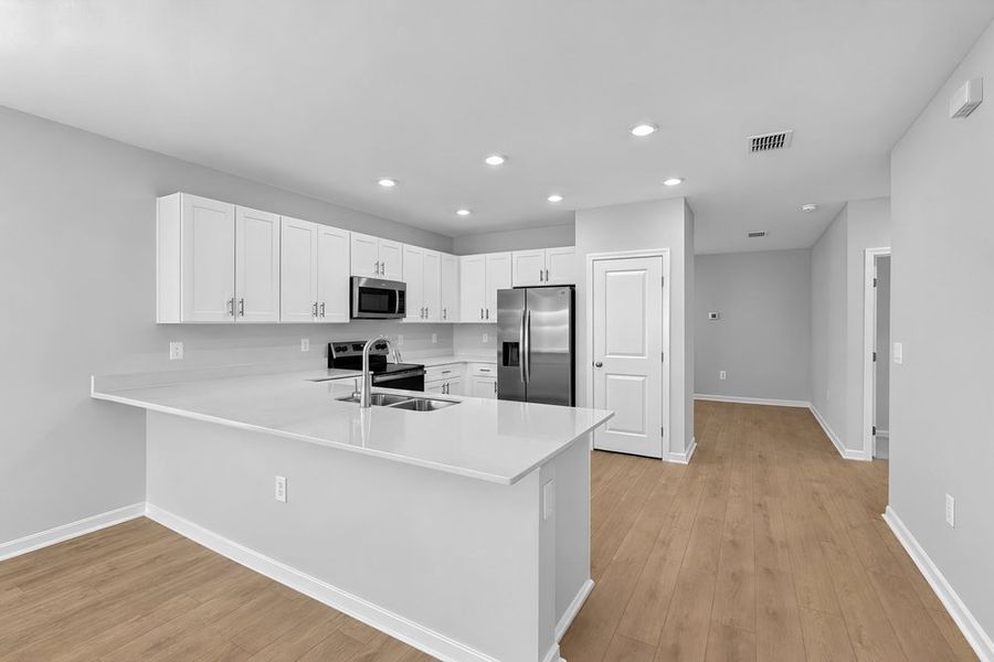 Furnished interior view inside a new home in Palm Wind, Hudson (Image 3).